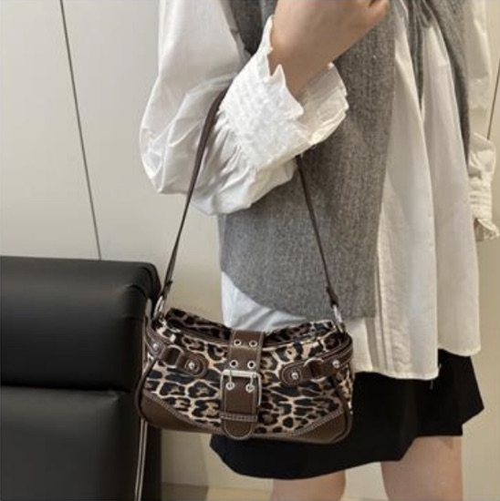 Leopard-print shoulder bag with brown buckle strap