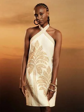Cream halter-neck mini dress with gold palm print